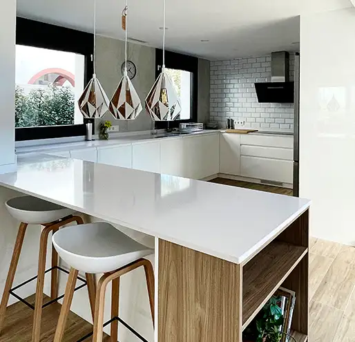 Recently renovated kitchen with white marble finishes